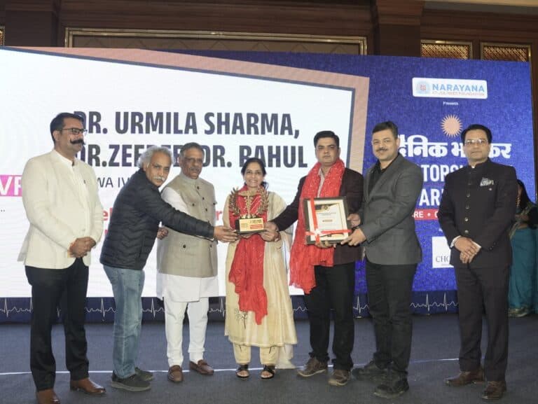 The directors of Ishwa IVF receiving the Best IVF Centre 2025 award from Dainik Bhaskar